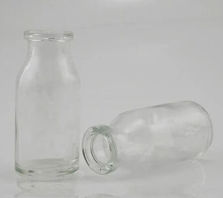 Klare und bernsteinfarbene Glasflasche aus Formglas